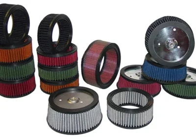 Automotive intake filter for removing dust and debris from engine airflow