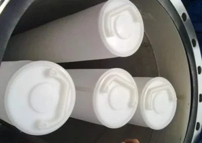 High flow particulate filter for removing solids from large-volume liquid or gas streams